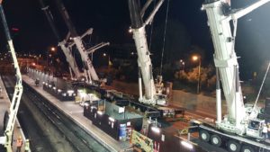 The line of cranes on the highway ready to lift the steel truss - HaShalom