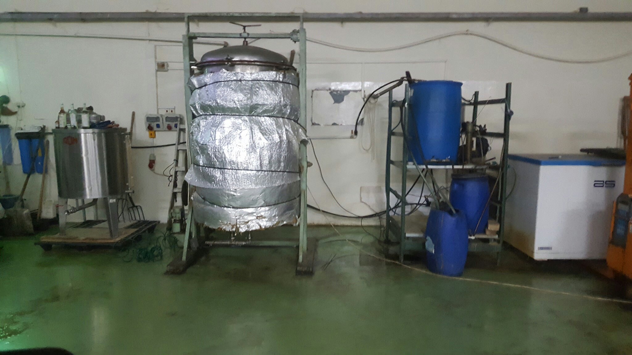 One way of producing essential oils is by steaming the herbs. This tank can hold up to 200kg of herbs. - Herbs of Kedem