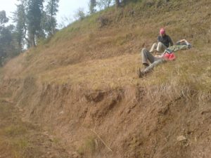 Lying on the grass in Namsaling - concrete