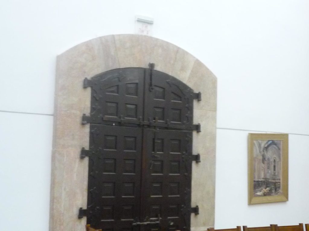 The window above the door from the inside, closed and sealed. And the door