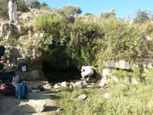 The first spring. The spring itself is running in a smell tunnel, and below it there is a cave that was used as a cemetery. - Shuqba cave