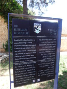 Sign telling the story of Metula
