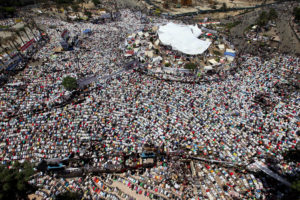 epa02814457 A general views shows Egyptian protesters performing the Friday prayer during a protest aimed at pressuring the country's military rulers into expediting the prosecution of former regime officials, in Tahrir Square Cairo, Egpyt, 08 July 2011. According to local sources, protesters are disappointed at what they say the slow pace of bringing former president Hosny Mubarak, ousted in a popular revolt earlier this year, and tainted officials to justice. EPA/KHALED ELFIQI new Middle East