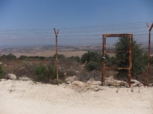 08032013-01 The fence around the Industrial area of Sal'it, the gate and the hole next to it.