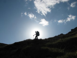 On the pass at Aigüestortes i Estany de Sant Maurici National Park with a big backpacks