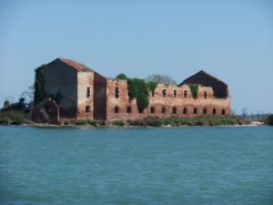 Buildings and old fashiond ship in the Venetian Lagoon - Ghetto