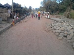 Working in the streets of Lalibela, paving them with stones and casting concrete trenches