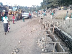 Working in the streets of Lalibela, paving them with stones and casting concrete trenches