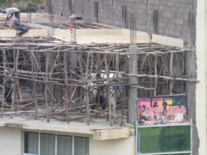 Building formwork with Eucalyptus branches - just like we build building in the Scouts summer camps  - hungry