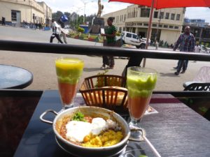 Eating broad beans dish, which Gondar is famous for - hungry