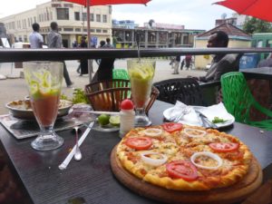 The coffee in the main square - The pizza Atzva haven't finish and the poor hungry child asking for food.