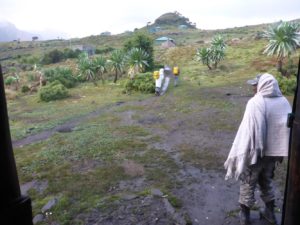 Girls bringing water from the pump - hungry