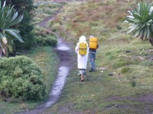 Girls bringing water from the pump - hungry