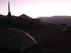 The sunrise over our tent in the campground - squat 