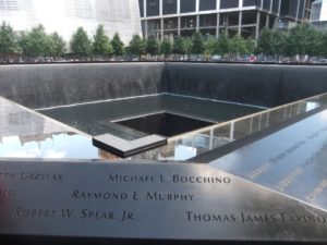08292014-05 Smell - The September 11 memorial On places of the twin towers, there are two black pools. The water are spilling from the edges to floor of the pool, and from there to a hole in the center of it.