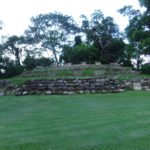 Temple X - The building is accessed via a wide staircase made of large blocks of carved stone.