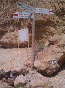 2014-06-07-10-43-20 Creek junction, we are going to Wadi Darga. The number is for the rescue forces, in case it is too late or a sudden flood accrues