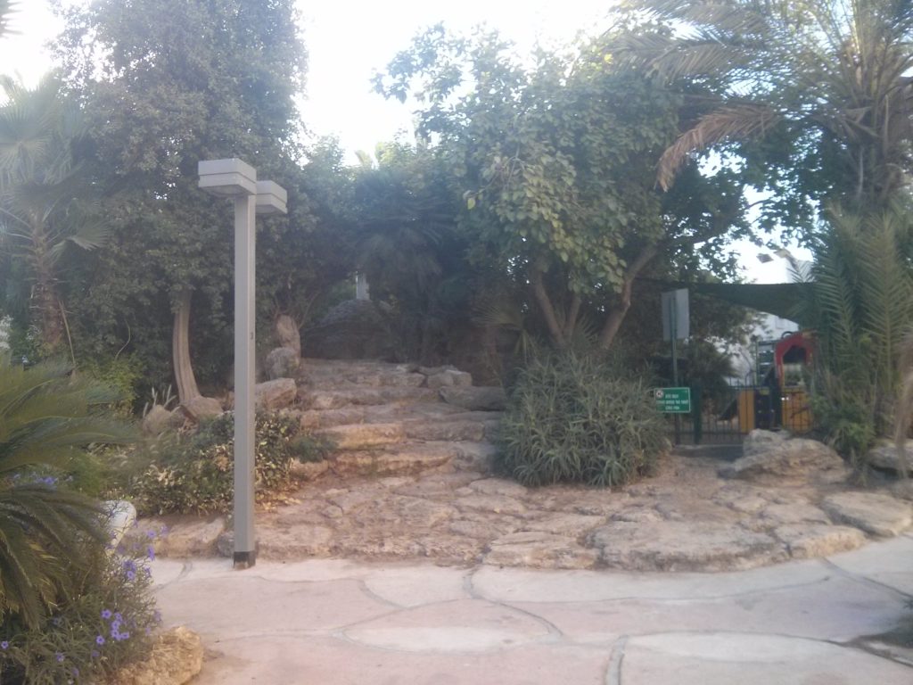 The garden and the small waterfall below and around the memorial pillar  - Allenby