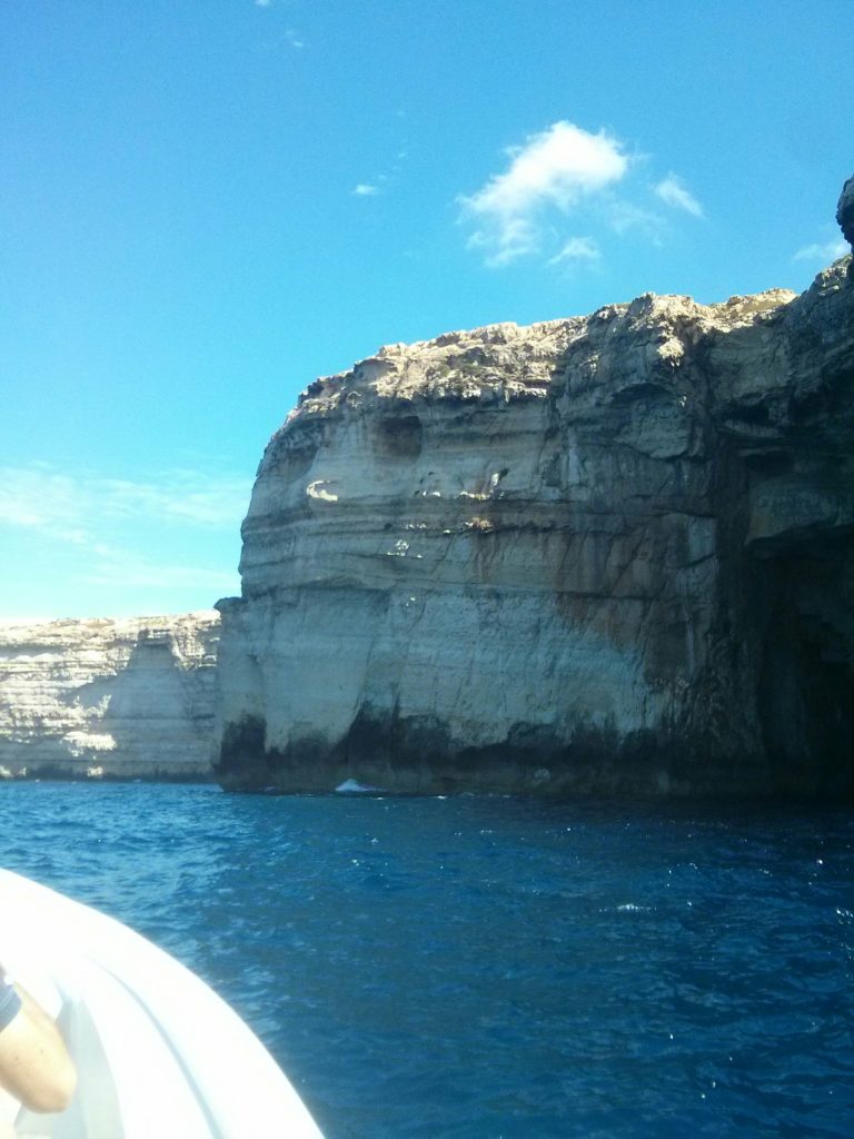    A boat trip around Azure window and the cliffs