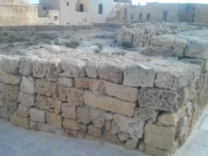 Sandstone or limestone - but more than anything it looks like stoned coral . - Baby-moon