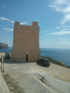 The coastal watch tower over the Blue Grotto