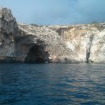 The blue grotto and rock just about to slide down to the sea 