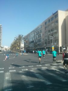 Not only they took over the city, they also cross in red light! half a Marathon