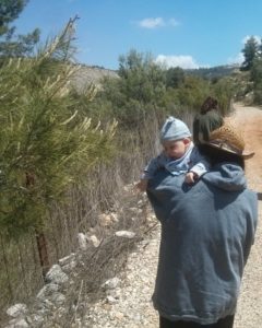 Jannaues carried by one of his grandmothers