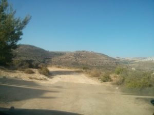 The outskirts of Al-Bireh and down below the village of Ein_Qiniyye