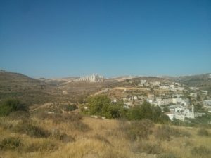 The outskirts of Al-Bireh and down below the village of Ein_Qiniyye