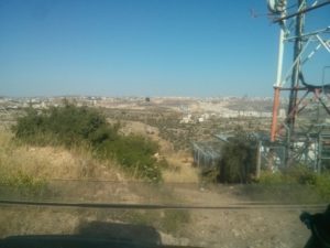 Looking from Haresh on Ramallah, the colorful area in the middle is the amusement park of Ramallah   - RZR