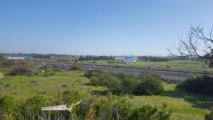 From the east of the hill are Ayalon highway  - Tel-Aviv main road