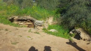 Third cave with the round rock that used to sill the cemetery and prevent ritual impurity (Tumah) from the living. - Pi-Glilot