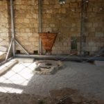 A new reconstructed flour mill with the millstone. The top is a rock from the Golan Heights while the bottom one is a local limestone.