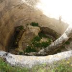 The pool from within. dug in two stages: the first is 11.8m in diameter and 10.8m in deep. The second continues 13 meter down into a water chamber, but is closed with rock.