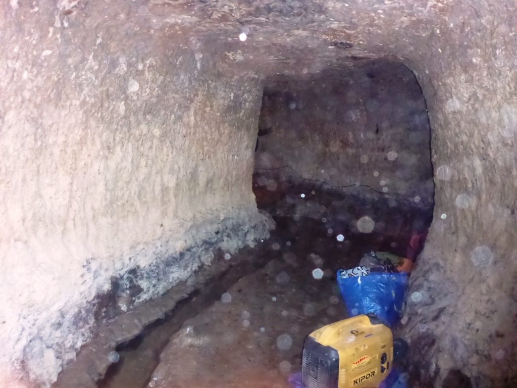 The spring tunnel about 60 meter long, 2*2 meter. Wonderful of chiseling. The guys there are trying determine what is the age of the tunnel. Those tunnels are dug in order to increase the water flow by allowing it to run easily in the tunnel instead through the rock. - Tel Gibeon