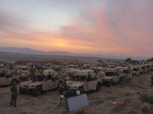 A whole brigade simulate by hummers - masked Hummer