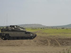 A Merkava Mk4 Tank leading the force