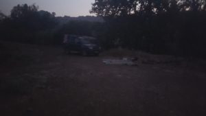 People camping along raging Jordan river