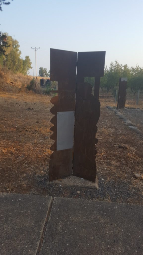 An information sign showing the words of Eliezar Segal, the Moshava chairman, during the fight on 1948: "I will not retreat from here. I was born here, and here I will die". Mishmar HaYarden
