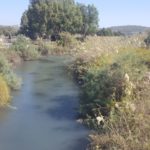 The stream of Nahal Taninim going through the dam and on the the sea.