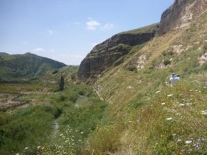 The Yarmouk river, the line of the railway to tunnel and the cliff it went through - The Hejaz railway tunnel