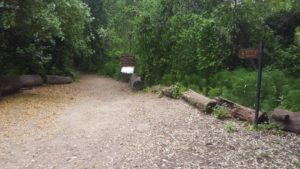 The sign to and a sign on the hidden stream creek