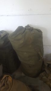 Kitbag full of military equipment