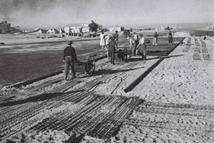 Workers paving the Airport runaway on 1938 - Sde dov airport
