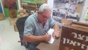 uncle Aaron signing our book