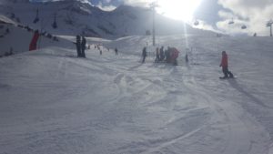 An injuried skier on the slope - ski injuries