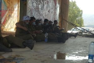 Sitting in a lecture with masks for the Coronavirus - The headquarters building of the Syrian forces on Golan heights