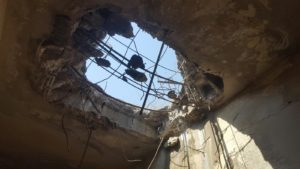 A hole in the roof of the building, probably from Yom Kippur war - The headquarters building of the Syrian forces on Golan heights