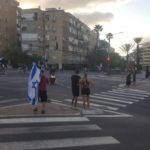 The big junction (Bialik - Aba Hillel) protest by the black flags. Still, only a km away from my house. - 1km